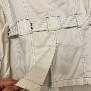 Stylish White Jacket with Blue Stitching and Buttons